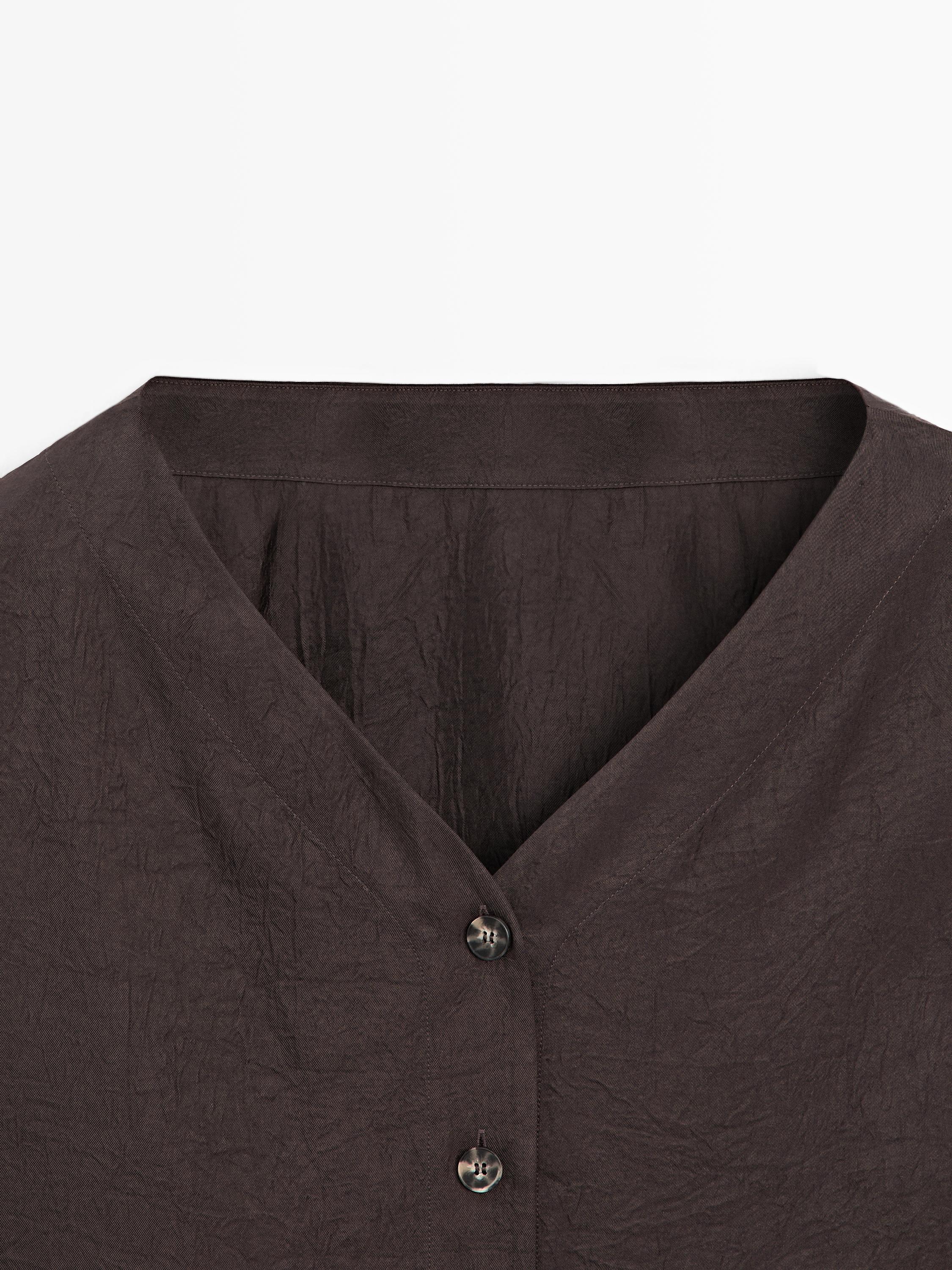 Flowing blouse with button details